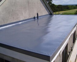 Clean grey GRP fibreglass flat roof on a Gloucestershire property